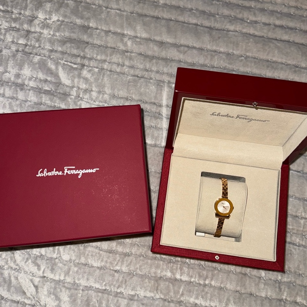 NWT Salvatore Ferragamo rose gold watch size is 8” pristine condition box n case